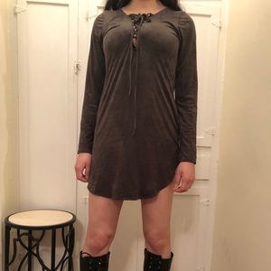 Long sleeve, low cut tie detail, round hem.